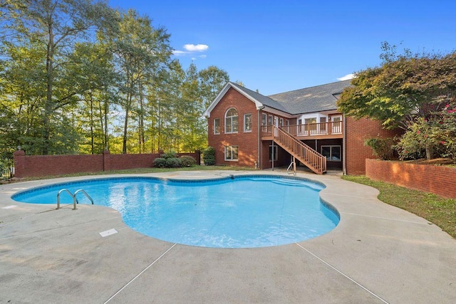 view of pool featuring a deck