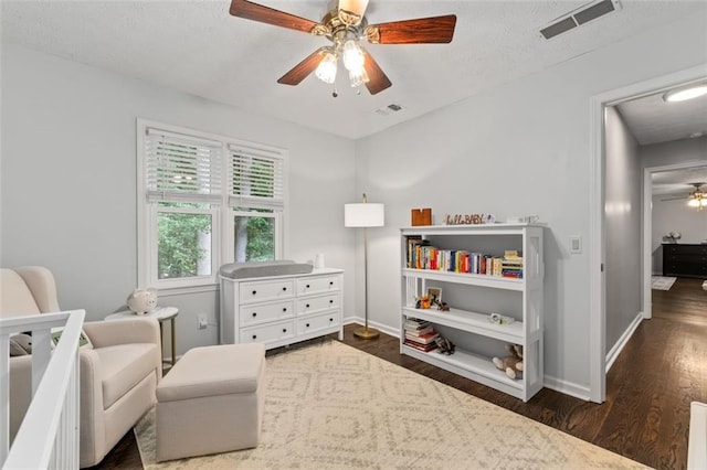 4546 Graywood Trce, Peachtree Corners, GA 30092 - sitting room with a ceiling fan, wood finished floors, and a textured ceiling