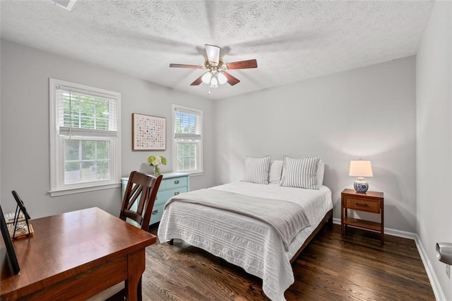 4546 Graywood Trce, Peachtree Corners, GA 30092 - bedroom with wood finished floors, a textured ceiling, and ceiling fan
