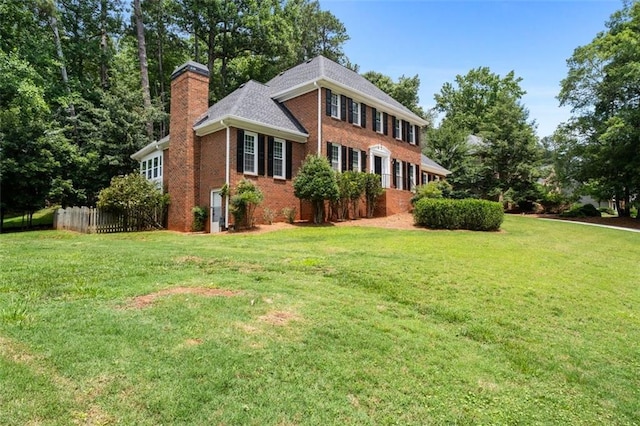 4546 Graywood Trce, Peachtree Corners, GA 30092 - colonial home featuring a chimney and brick siding
