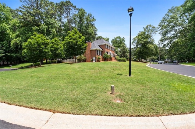 4546 Graywood Trce, Peachtree Corners, GA 30092 - view of front of property featuring a front lawn and a chimney