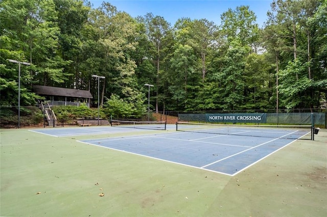 4546 Graywood Trce, Peachtree Corners, GA 30092 - view of tennis court with a view of trees