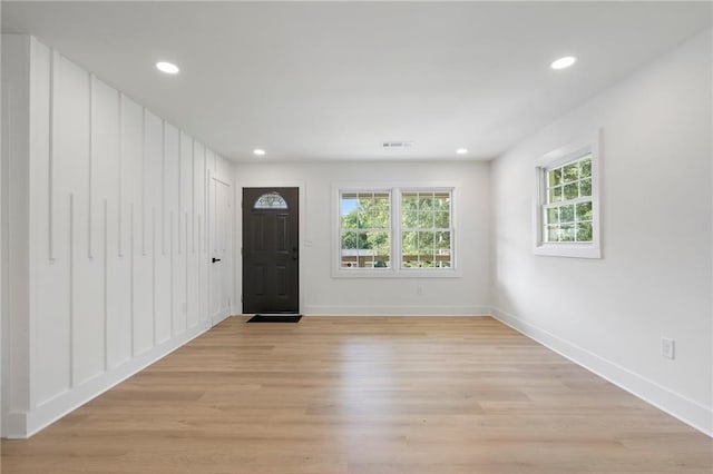 1409 Georgia Ave, East Point, GA 30344 - entrance foyer featuring light wood-style flooring and recessed lighting