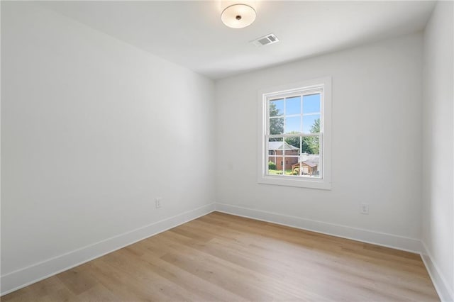 1409 Georgia Ave, East Point, GA 30344 - unfurnished room with light wood-type flooring and baseboards
