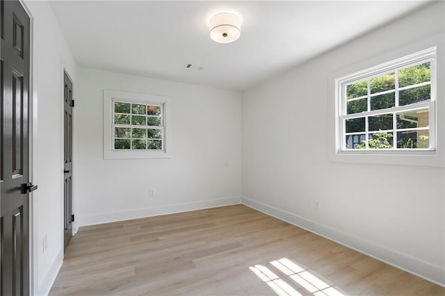 1409 Georgia Ave, East Point, GA 30344 - empty room with light wood-style flooring
