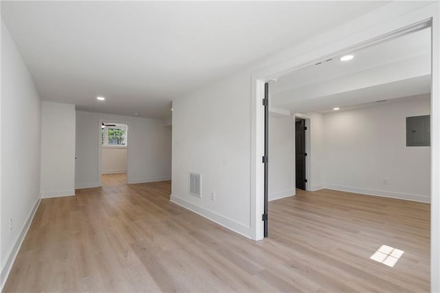 1409 Georgia Ave, East Point, GA 30344 - spare room featuring light wood-style flooring, electric panel, and recessed lighting