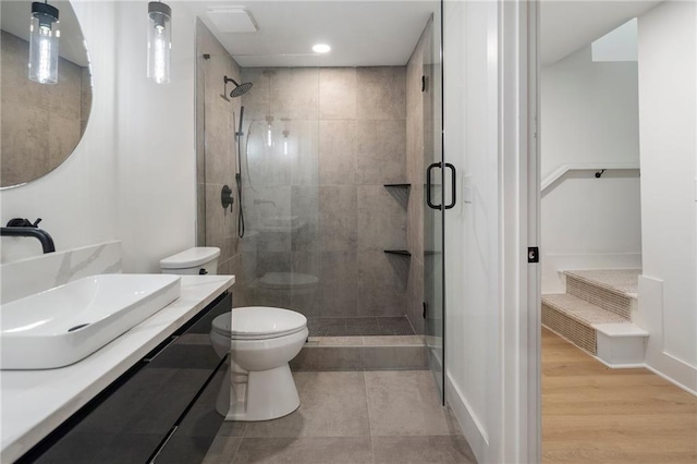 1409 Georgia Ave, East Point, GA 30344 - full bath featuring a stall shower, vanity, and a closet