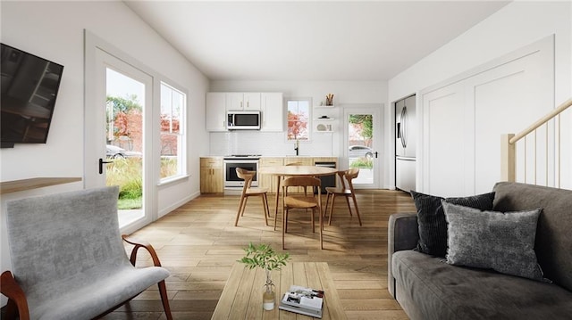 interior space with light hardwood / wood-style flooring and sink