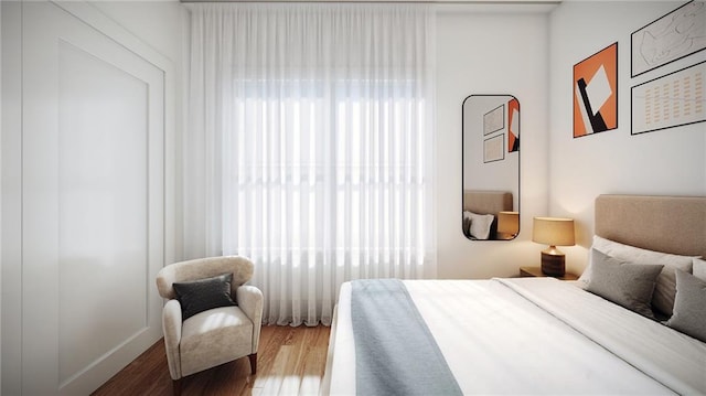 bedroom featuring hardwood / wood-style floors