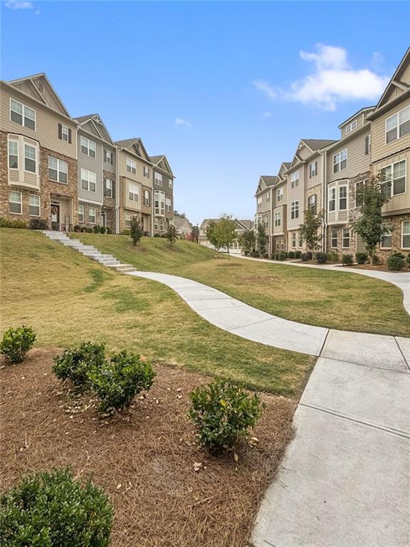 view of community with a lawn