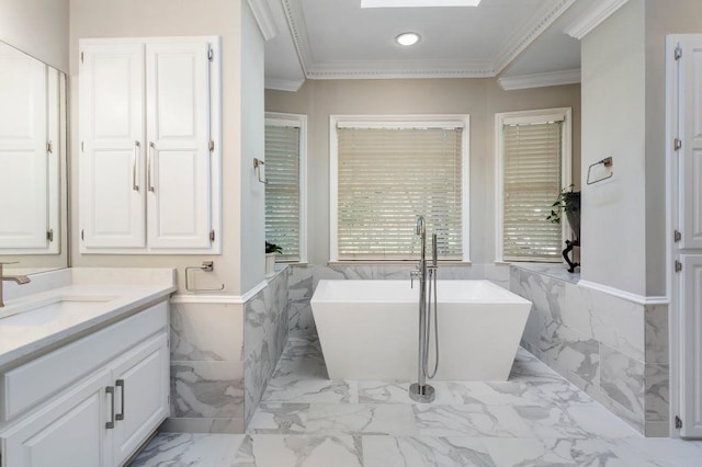 940 Waters Reach Ct, Alpharetta, GA 30022 - full bath with marble finish floor, a freestanding bath, ornamental molding, and vanity