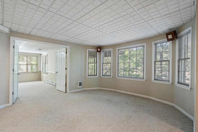 940 Waters Reach Ct, Alpharetta, GA 30022 - spare room with carpet floors, baseboards, and a baseboard heating unit