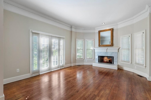 940 Waters Reach Ct, Alpharetta, GA 30022 - unfurnished living room featuring a fireplace, wood finished floors, baseboards, visible vents, and ornamental molding