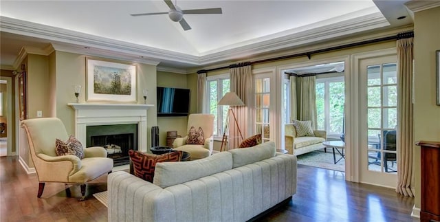 470 Ansley Walk Ter NE, Atlanta, GA 30309 - living area with a fireplace, a ceiling fan, crown molding, dark wood-type flooring, and vaulted ceiling