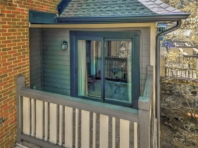 470 Ansley Walk Ter NE, Atlanta, GA 30309 - doorway to property with a shingled roof and brick siding