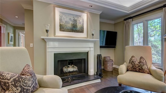470 Ansley Walk Ter NE, Atlanta, GA 30309 - sitting room featuring wood finished floors, crown molding, a fireplace with raised hearth, and recessed lighting