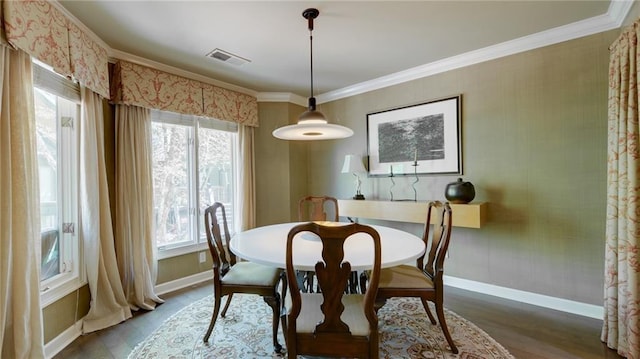 470 Ansley Walk Ter NE, Atlanta, GA 30309 - dining space featuring wood finished floors and crown molding