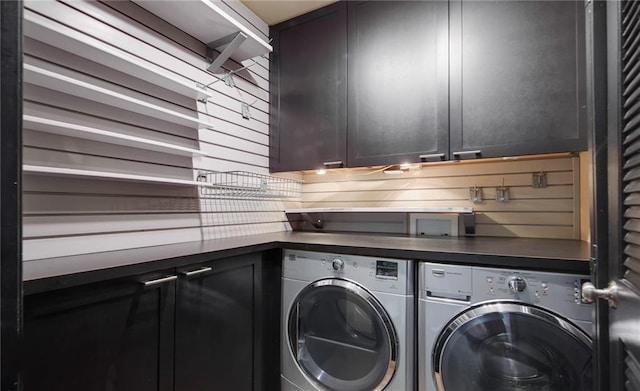 470 Ansley Walk Ter NE, Atlanta, GA 30309 - washroom with cabinet space and washing machine and clothes dryer