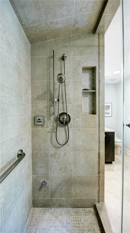 470 Ansley Walk Ter NE, Atlanta, GA 30309 - full bathroom with tiled shower, tile patterned floors, and vanity