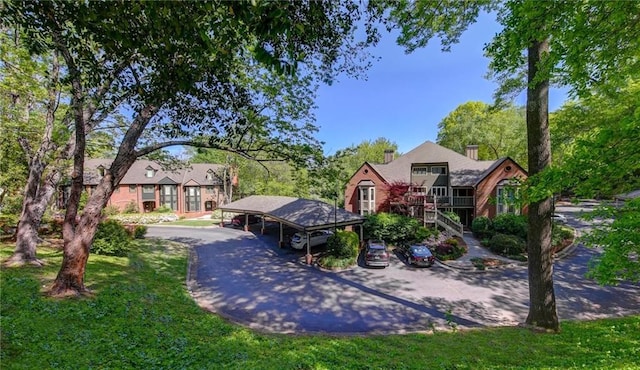 470 Ansley Walk Ter NE, Atlanta, GA 30309 - view of front of house with stairway and a carport