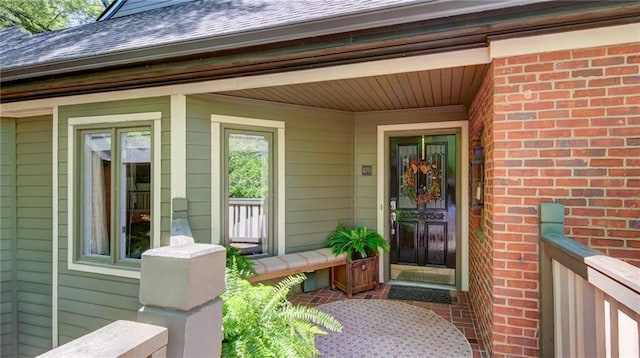 470 Ansley Walk Ter NE, Atlanta, GA 30309 - doorway to property with covered porch and brick siding
