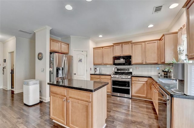2837 Peachstone Ct, Lawrenceville, GA 30043 - kitchen with appliances with stainless steel finishes, light brown cabinets, crown molding, dark wood-style floors, and decorative backsplash