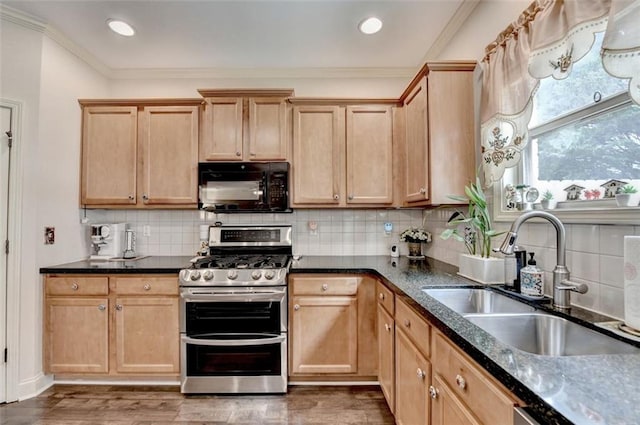 2837 Peachstone Ct, Lawrenceville, GA 30043 - kitchen featuring black microwave, double oven range, a sink, wood finished floors, and ornamental molding