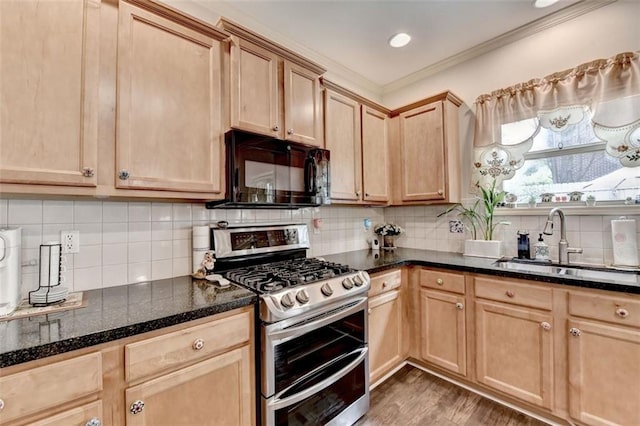 2837 Peachstone Ct, Lawrenceville, GA 30043 - kitchen featuring double oven range, black microwave, a sink, light brown cabinets, and backsplash
