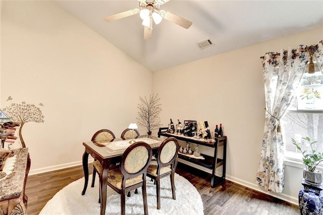 2837 Peachstone Ct, Lawrenceville, GA 30043 - dining room with a ceiling fan, lofted ceiling, wood finished floors, and baseboards