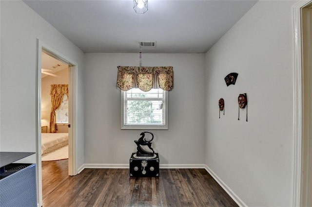 2837 Peachstone Ct, Lawrenceville, GA 30043 - unfurnished dining area featuring baseboards and dark wood-style flooring