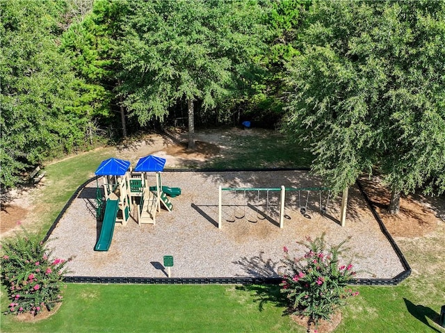 community playground featuring a lawn