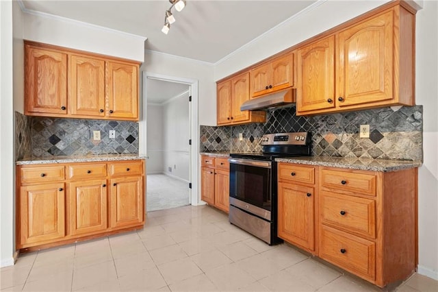 kitchen with light tile patterned floors, light stone counters, ornamental molding, and electric stove