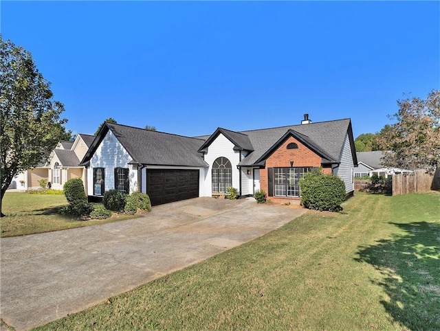 view of front facade featuring concrete driveway, brick siding, a front lawn, and an attached garage