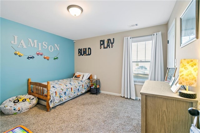 bedroom featuring carpet floors, baseboards, and visible vents