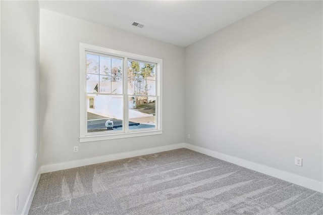 view of carpeted spare room