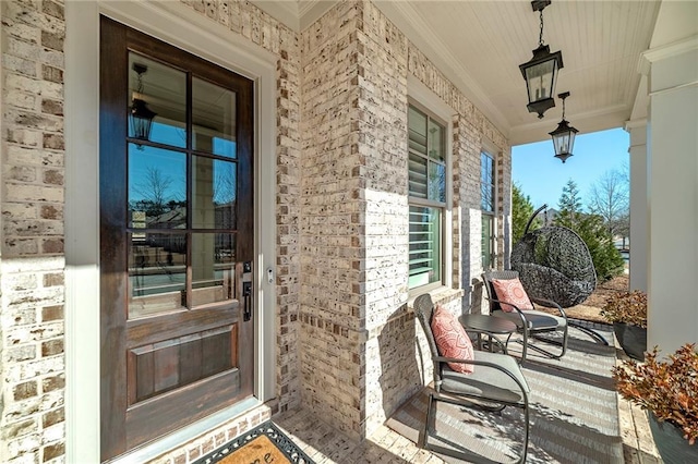 property entrance featuring a porch