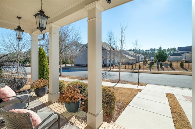 view of patio featuring a porch