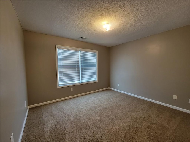 285 Fieldview Ln, Covington, GA 30016 - empty room with carpet and a textured ceiling