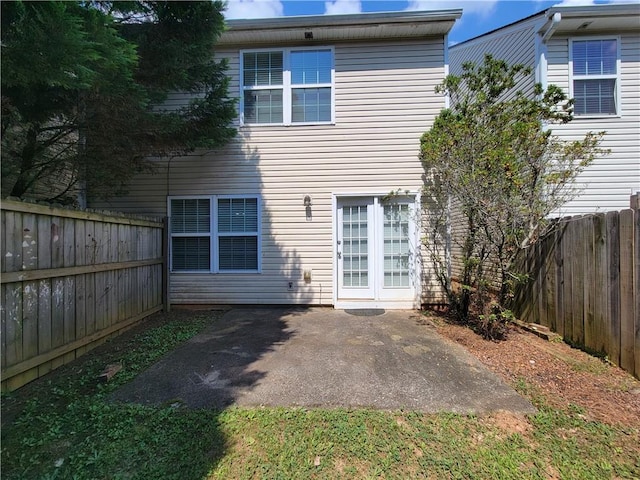 285 Fieldview Ln, Covington, GA 30016 - back of property with a patio and a fenced backyard