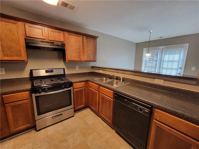 285 Fieldview Ln, Covington, GA 30016 - kitchen with black dishwasher, gas stove, under cabinet range hood, dark countertops, and brown cabinetry