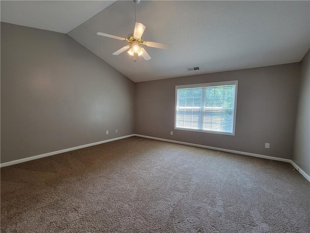 285 Fieldview Ln, Covington, GA 30016 - unfurnished room featuring lofted ceiling, carpet floors, and a ceiling fan