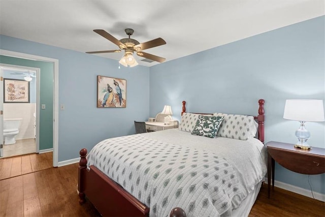 bedroom featuring dark wood-type flooring and ceiling fan