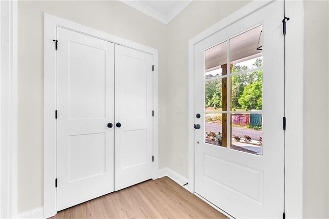 doorway with light hardwood / wood-style floors