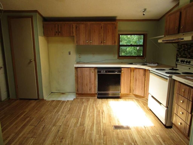 kitchen featuring white range, sink, light wood-type flooring, exhaust hood, and dishwasher