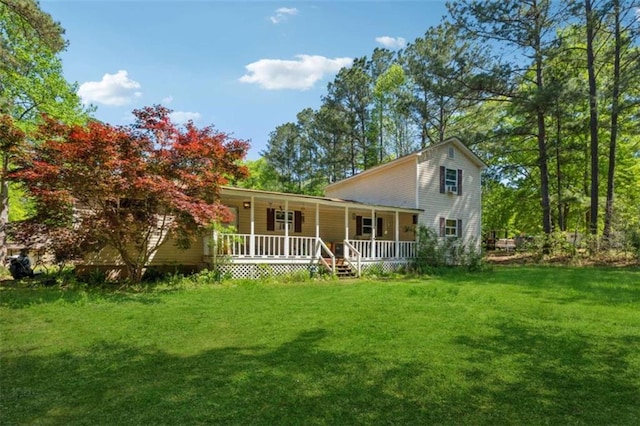 151 Grandma Branch Rd, Grantville, GA 30220 - back of property with a lawn and covered porch