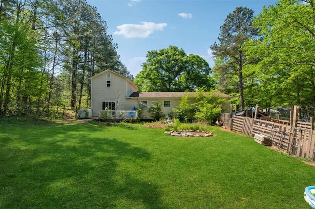 151 Grandma Branch Rd, Grantville, GA 30220 - rear view of property with fence and a yard