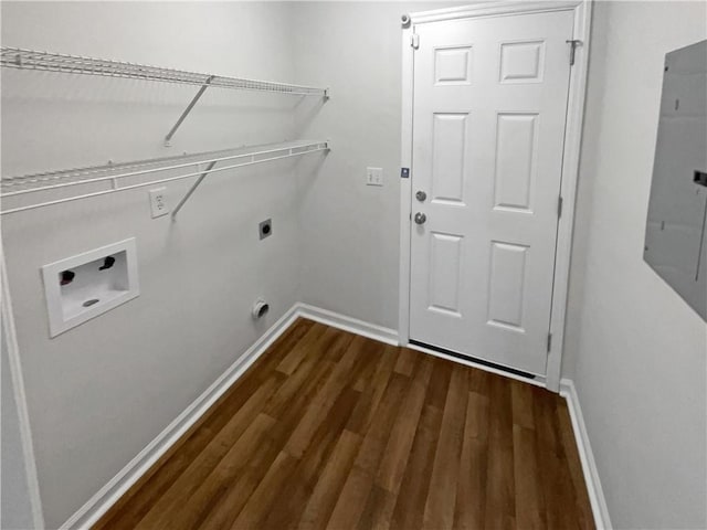 laundry area featuring electric dryer hookup, electric panel, dark wood-type flooring, and hookup for a washing machine