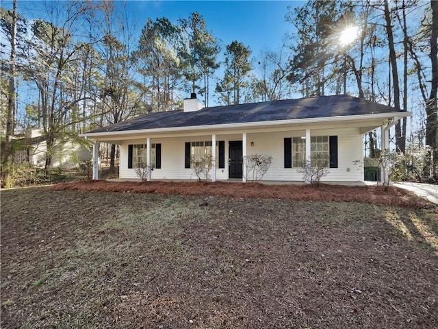 ranch-style house with a porch