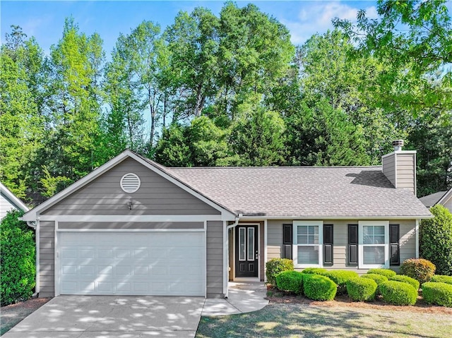 498 Walnut Woods Dr, Braselton, GA 30517 - ranch-style house featuring an attached garage, driveway, a chimney, and roof with shingles