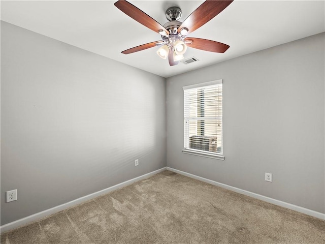 498 Walnut Woods Dr, Braselton, GA 30517 - carpeted spare room featuring a ceiling fan, baseboards, and visible vents
